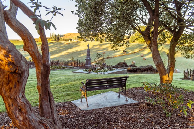 Pukerau Cemetery - Image showing graves with bench in the foreground