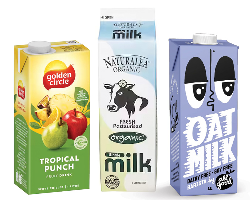 A variety of tetrapack containers, juice, milk and oat milk.